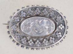 A Victorian silver filigree and foliate brooch hav