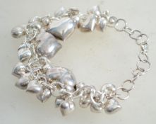A sterling silver rolo link heart charm bracelet w