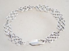 A sterling silver bracelet chain with a lobster cl