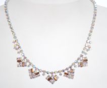 A 1950s aurora rhinestone necklace in a silver ton