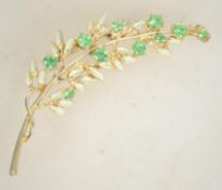 A large vintage 1950s rhinestone and enamel brooch