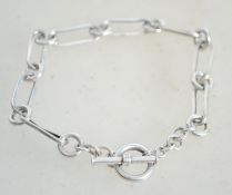 A sterling silver bracelet chain having oblong spa