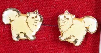 A pair of 9ct gold and white enamel pictorial earr