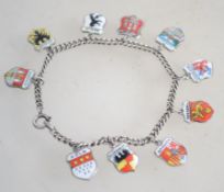 A sterling silver curb link charm bracelet having