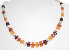 A sterling silver necklace chain having silver and