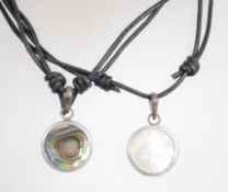 A pair of Mamo Australian silver necklace pendants