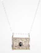 A sterling silver pill box locket having opening s