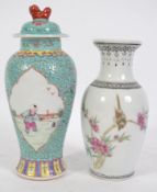 An Oriental Cantonese vase having a waisted neck a