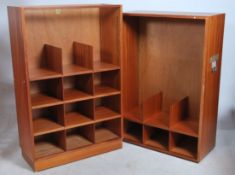 A large twin modular teak wood bookcase by Simplex