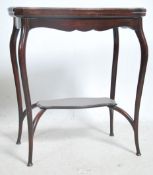 An Edwardian card / games table of small form rais