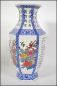 A Chinese blue and white famille rose vase decorat