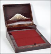 An early 20th century lacquered Japanese  writing