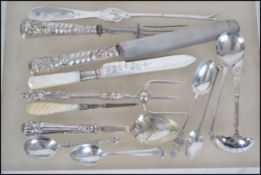 A group hallmarked silver, silver handled and silv