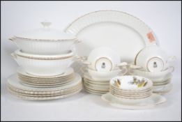 A vintage Paragon china soup and dinner service to