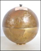 A 1950's retro spherical cigarette dispenser havin