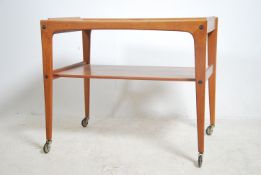 A 1970's Danish teak wood butlers serving trolloy