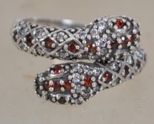 A  silver  red stone and marcasite set dress ring