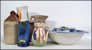 A 20th century stoneware flagon for Pick Up and Co