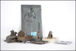 A collection of six items to include bronze pieces