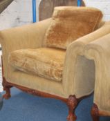 A good pair of antique style armchairs raised on c