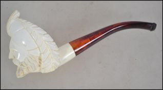 A leather cased vintage meerschaum pipe having a s
