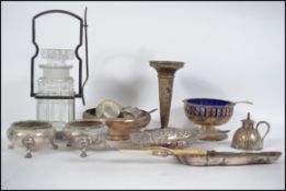 A collection of silver plated items to include sal