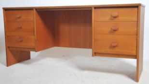 A 1970's teak wood twin pedestal writing table des