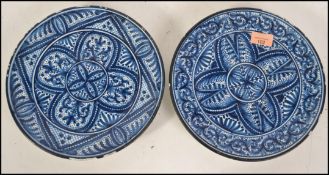 A pair of hand painted 19th century blue and white