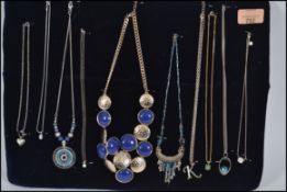A group of 10 vintage silver and costume jewellery