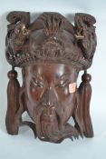 A heavy well carved early 20th century Chinese fac