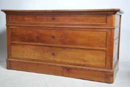 A 19th century French fruitwood twin pedestal desk
