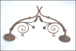 A pair of 19th century cast iron rococo wall brack