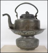 A 19th / 20th century middle eastern hand beaten k