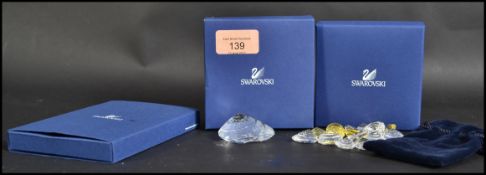 A group of Swarovski crystal glass conch shells to