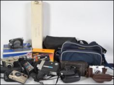 A collection of vintage 20th century 35mm cameras