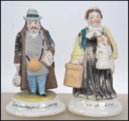 A pair of 19th century ceramic spill vase figurine