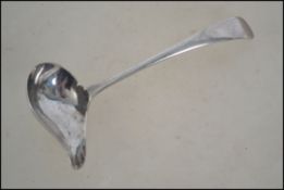 A silver hallmarked ladel pourer by Edward Viner b