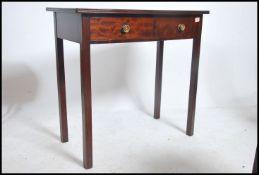 A 19th century bow front mahogany writing table de