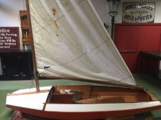 A 1950's French sailing boat - dinghy. The wooden
