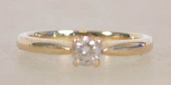 A 9ct gold and diamond ladies single stone solitai