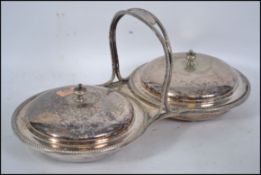 A vintage 20th century silver plated twin handled