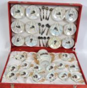 A mid 20th century cased Lustre ceramic coffee ser