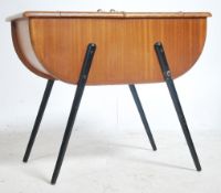 A good mid century sewing box cabinet being raised