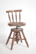 A Victorian Industrial clerks swivel chair in maho