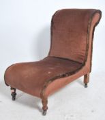 A 1920's nursing chair raised on turned legs with