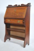 A 19th century Arts & Crafts oak students bureau.
