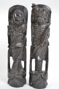A pair of Chinese hardwood and silver line inlaid