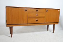 A 1970's retro Danish influenced teak wood sideboa