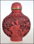 A 20th century Chinese cinnabar style red laquered