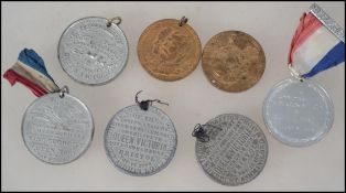 A small collection of commemorative medals dating